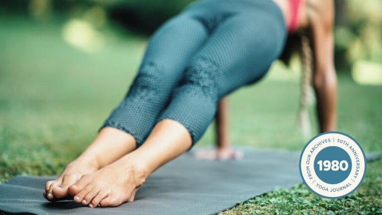 A woman in upward plank pose