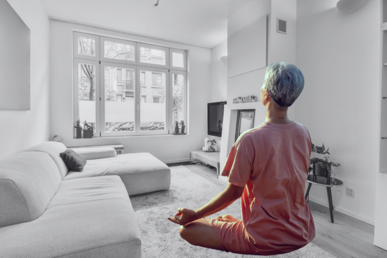 A woman enjoying a yoga retreat at home