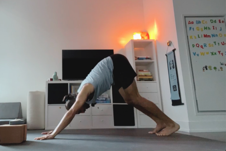 oga teacher Jaffer Hussain in Downward-Facing Dog, part of his simple yoga flow