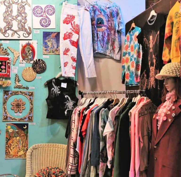 Colorful vintage clothing and accessories on display at Bon Voyage Vintage, one of the best thrift stores in Seattle's Pioneer Square neighborhood