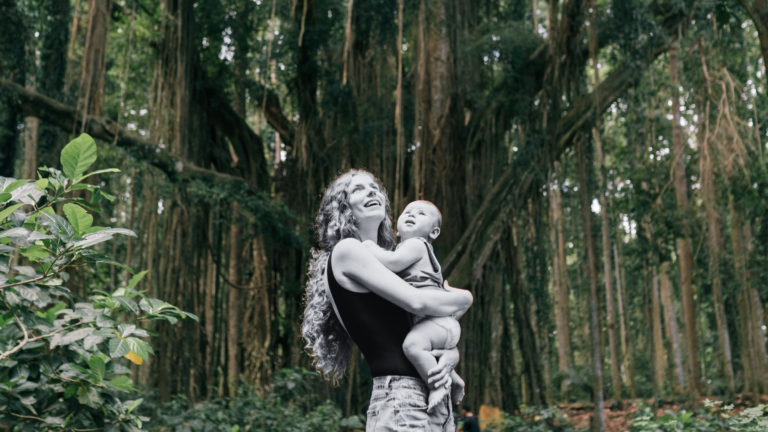 A woman and her baby at Wanderwild, a good location for a family wellness retreat