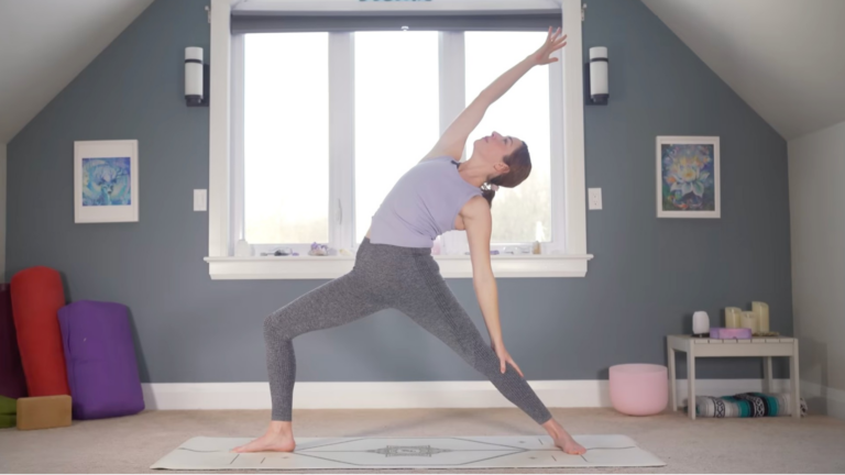 Woman standing in Reverse Warrior Pose
