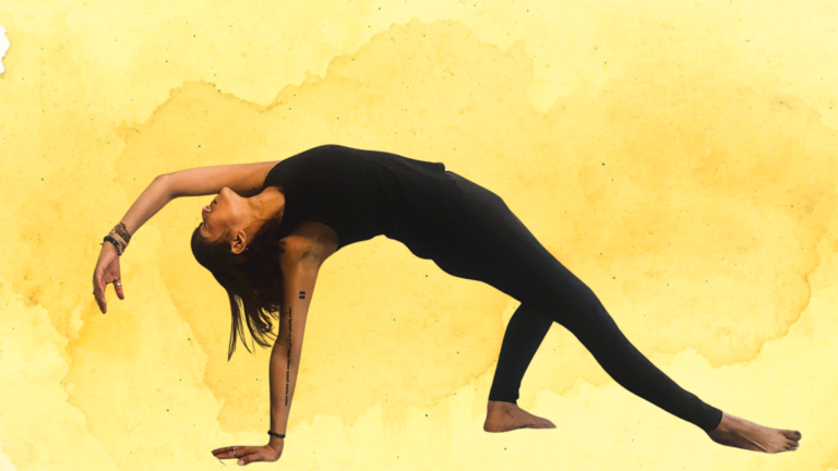 Woman practicing Wild Thing against a yellow watercolor backdrop